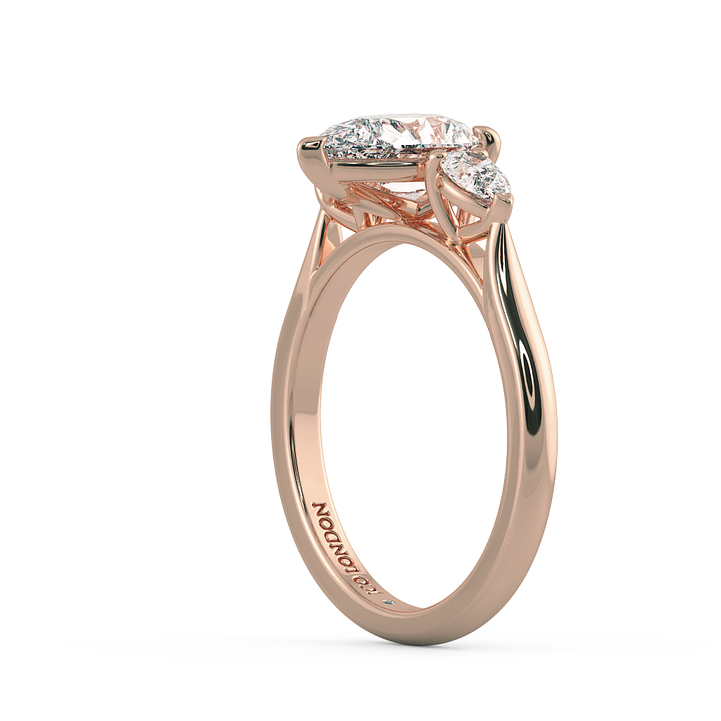 Pear Three Stone Engagement Rings