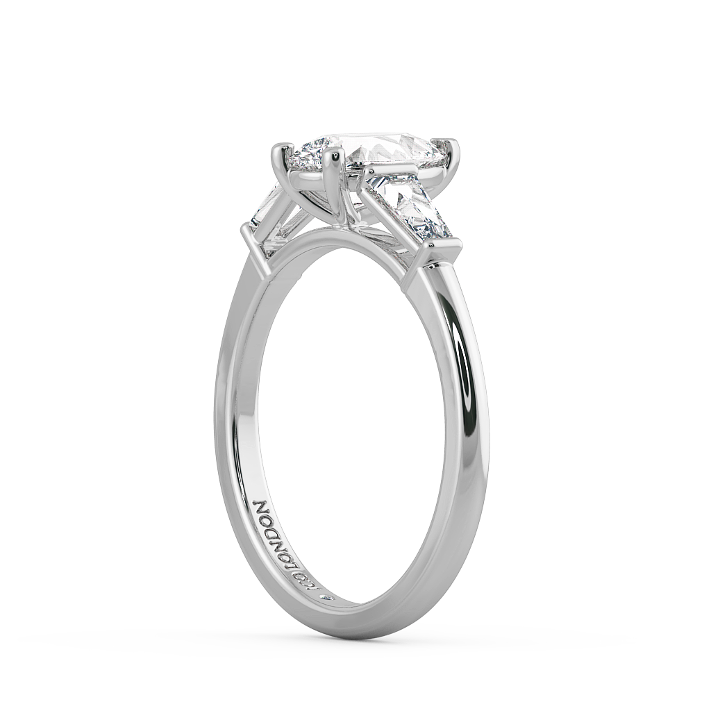 Pear Three Stone Engagement Rings