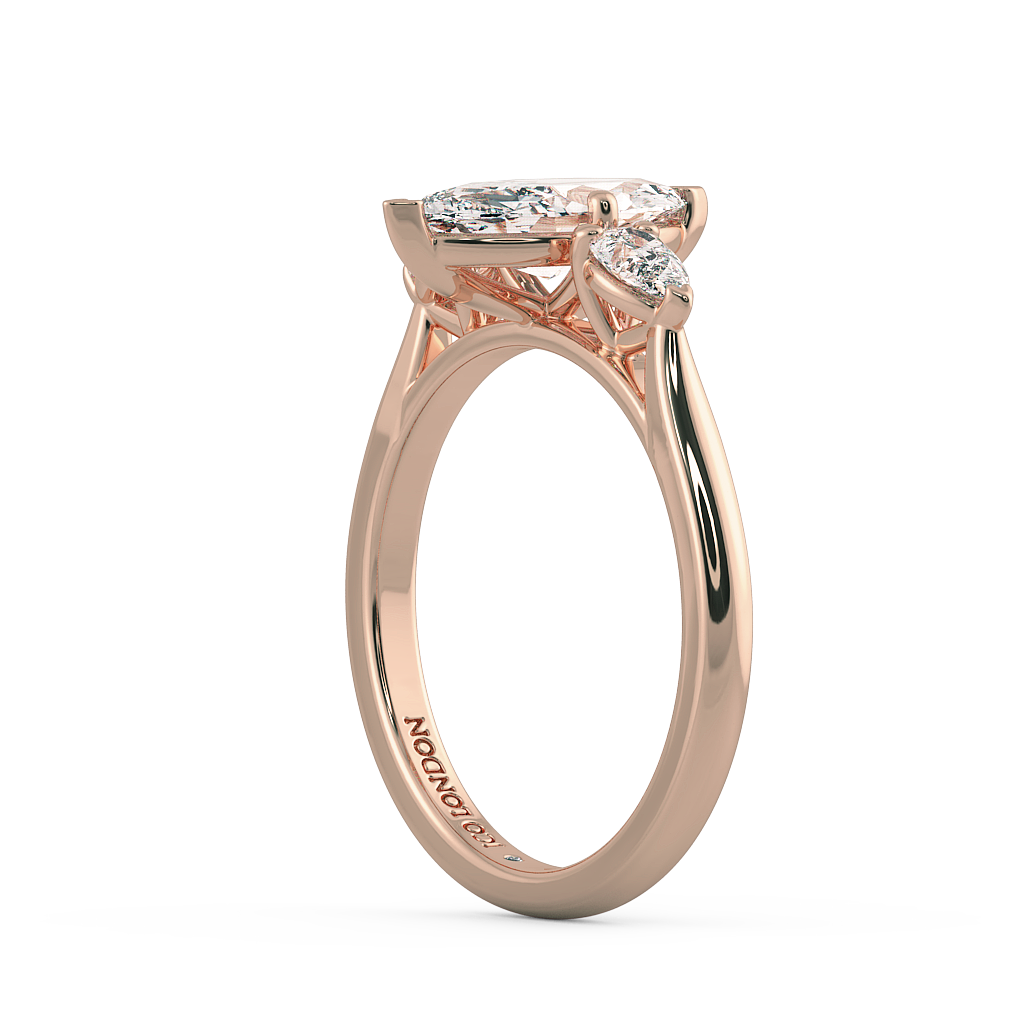 Marquise Three Stone Engagement Rings